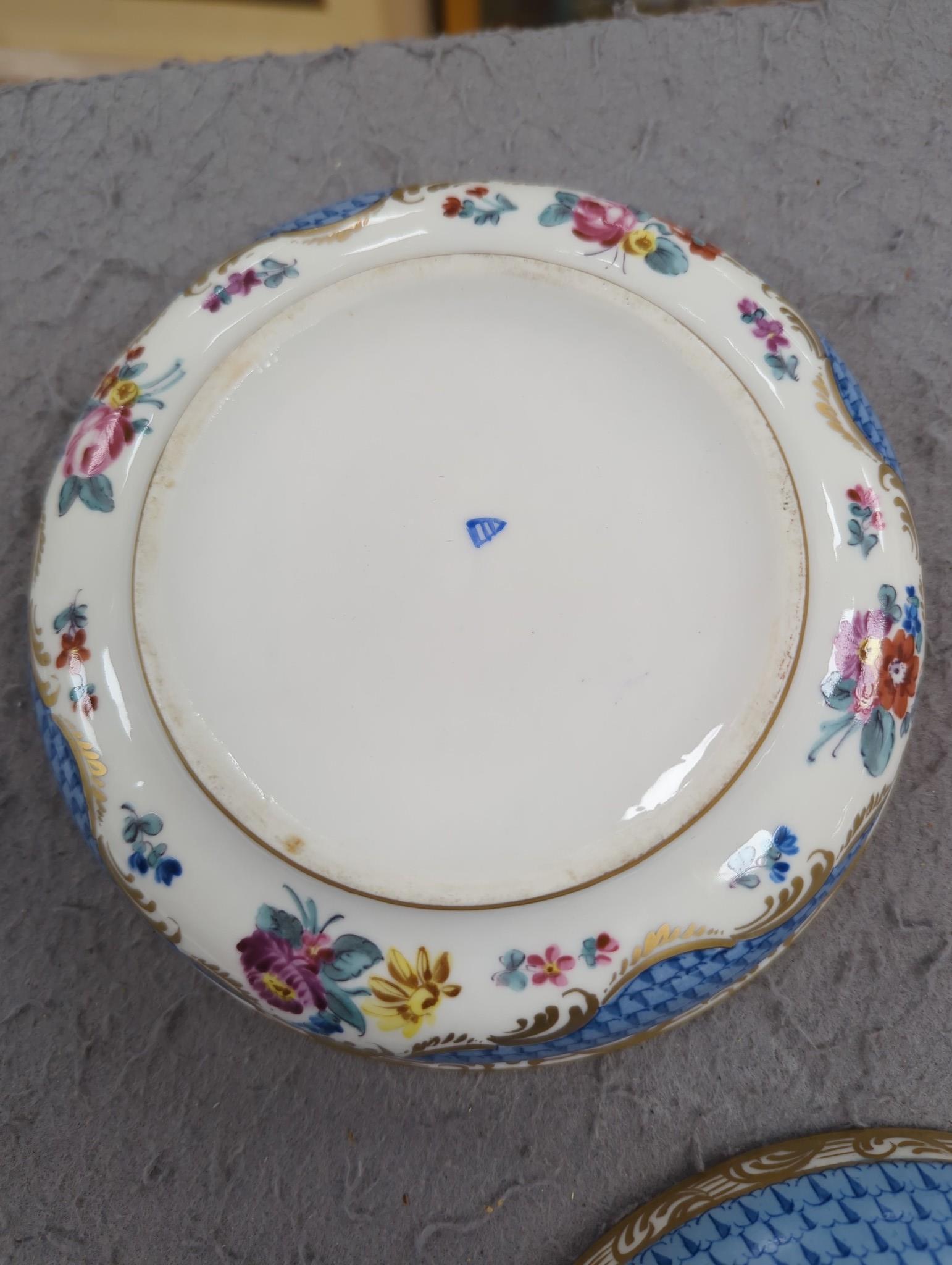 Two 19th century Meissen plates, 24.5cm, a 19th century Copenhagen porcelain dish and a pair of Continental porcelain ecuelles covers and stands